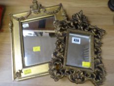 TWO MIRRORS being a small antique gilt framed wall mirror with crowned crest finial and applied