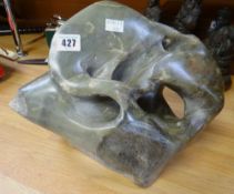 A LARGE BELIEVED JADE MINERAL ABSTRACT SCULPTURE of natural form, 37cms wide x 34cms high