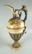 A HADLEY'S WORCESTER JUG on a circular base and of elaborate form with gryphon handle and with