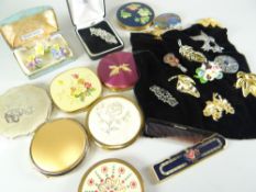 COLLECTION OF BROOCHES and powder compacts