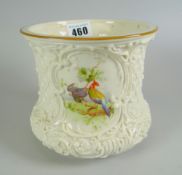 A ROYAL WORCESTER PORCELAIN IVORY GROUND PLANTER, decorated with relief moulding and three panels of