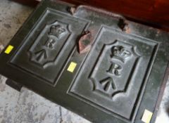 A HEAVY VINTAGE CAST-IRON STRONGBOX with key and carry-handles, with embossed Royal cypher to lid