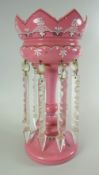 AN ANTIQUE PINK AND SATIN GLASS DROP-LUSTRE VASE having a circular base and coronet top, 33cms high
