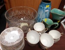 A LARGE CUT GLASS FRUIT BOWL, parcel of Royal Stafford gilt decorated teaware etc.