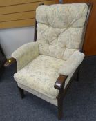 C20TH SPINDLE BACK FLORALLY UPHOLSTERED ARMCHAIR