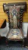 C19TH PRIE DIEU PRAYER CHAIR having floral tapestry seat and back flanked by spiral columns and