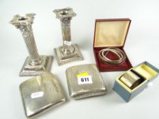 A PARCEL OF SILVER comprising pair of architectural square based candlestick holders, two concave