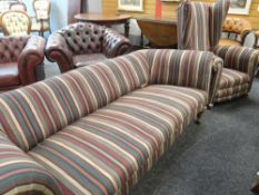 FABRIC UPHOLSTERED SCROLL SETTEE together with similar wing armchair (2)