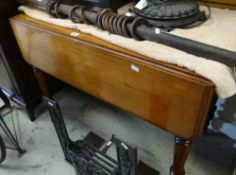 LIGHT OAK PEMBROKE TABLE with single drawer on turned legs with brass castors