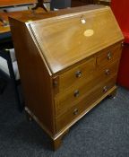 A GOOD INLAID MAHOGANY SLOPED-FRONT BUREAU of two long and two short drawers, the slope hingeing