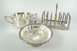 THREE SILVER/WHITE METAL ITEMS comprising a shaped circular silver dish, Birmingham 1933, 3.5ozs and