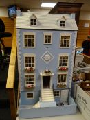 A LARGE 'GEORGIAN' MANSION DOLL'S HOUSE with nine front windows, steps and windows to the roof