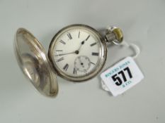 AN ANTIQUE SILVER FULL-HUNTER POCKET WATCH having a keyless wind operation and with white