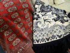 EASTERN DESIGN RED GROUND RUG having central field of guls together with modern floral and scroll