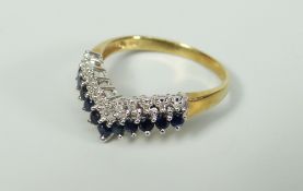 9CT YELLOW GOLD TWO ROW SAPPHIRE AND DIAMOND RING OF ARROWHEAD OR WISHBONE DESIGN. 2.4 grams