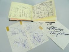 AN AUTOGRAPH BOOK & LOOSE PAGES SIGNED BY THE JIMI HENDRIX EXPERIENCE BAND MEMBERS & OTHERS '