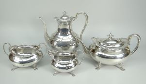 SILVER GEORGE V MATCHED SILVER FOUR-PIECE TEA & COFFEE SET comprising coffee pot, teapot, cream