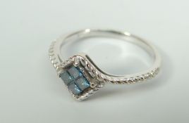 14K WHITE GOLD PRINCESS BLUE DIAMOND BAND BY SOPHIA FIORI. Estimated total stone weight 0.26ct, 1.