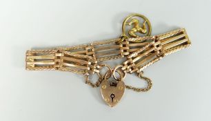 9CT GOLD FOUR BAR GATE BRACELET WITH HEART SHAPED PADLOCK and yellow metal (not gold) Isle Of Man