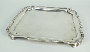 GEORGE V SILVER SQUARE SALVER OR TRAY RAISED ON FOUR CORNER FEET. London 1935, Mappin & Webb, 21 x