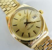 ROLEX OYSTER PERPETUAL DATE 14K GOLD GENTLEMAN'S WRISTWATCH on 14ct gold Rolex brick link bracelet