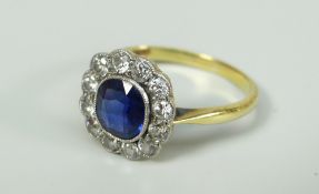 18CT YELLOW GOLD DIAMOND AND SAPPHIRE FLOWER HEAD OR CLUSTER RING. 3.1 grams approximately.
