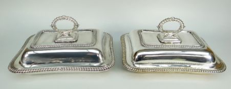 PAIR OF GEORGE V SILVER TUREENS AND COVERS OF RECTANGULAR FORM with detachable handles and gadroon