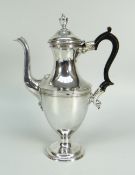 GEORGE III SILVER PEDESTAL COFFEE POT OF URN SHAPE with scrolled wooden handle and vase shape