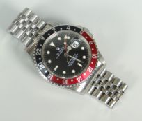 ROLEX GMT-MASTER II BLACK RED BEZEL WRISTWATCH with later jubilee bracelet, 16710, serial number