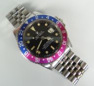 ROLEX GMT-MASTER 'FUCHSIA' WRISTWATCH with later jubilee bracelet, model 1675, serial number