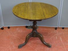 A PERIOD CIRCULAR TOPPED TRIPOD TABLE, 73 cms diameter