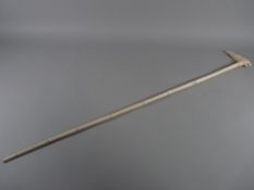 AN EARLY 20th CENTURY AFRICAN CARVED SECTIONAL IVORY WALKING STICK, the handle with elephant and