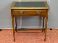 A REPRODUCTION SIDE TABLE with tooled leather effect top and single drawer, 71 cms wide, 46 cms
