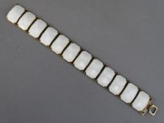 DAVID ANDERSEN, NORWEGIAN SILVER GILT & GUILLOCHE ENAMEL BRACELET of twelve linked white enamel