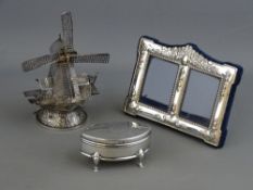 A DUTCH SILVER TABLE NOVELTY in the form of a windmill,12.5 cms high, a modern silver fronted double