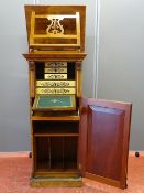 AN ANTIQUE FRENCH WALNUT ESCRITOIRE, neatly proportioned with capped column and carved panel front
