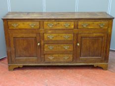 CIRCA 1840 & LATER OAK DRESSER BASE having a three plank top over a 'T' arrangement of six pine
