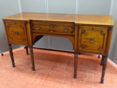 A REGENCY MAHOGANY SIDEBOARD, the inverted front with central drawer, deep bottle drawer and