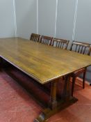 A GOOD LARGE SIZED REPRODUCTION OAK REFECTORY TABLE, the rectangular top over turned and block