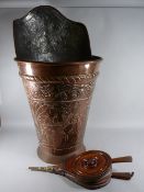 A 19th CENTURY REPOUSSE COPPER GRAPE HARVEST FESTIVAL HOD with leaf and horse mounted knight in