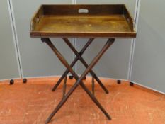 A VICTORIAN MAHOGANY BUTLER'S TRAY ON STAND, 74 x 53 cms the tray