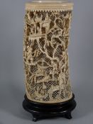 A LATE 19th CENTURY CHINESE CANTON CARVED IVORY TUSK VASE, profuse decoration of figures, pagodas