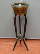 A KINGWOOD & EBONIZED GILT METAL MOUNTED PLANTER STAND, 94.5 cms high, 33.5 cms diameter