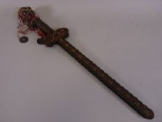 A CHINESE SPIRIT GUARDIAN COIN SWORD, possibly late 19th Century, 44.5 cms long, made up of