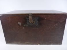 A LATE 18th CENTURY OAK LIDDED CHEST with iron strap hinges and lock, with interior candle box, 31