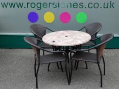AN AS NEW 'WERZALIT' GARDEN PATIO SET comprising four rattan elbow chairs and a circular table, 90
