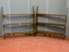 A PAIR OF HANGING PLATE RACKS with graduated shelves, 97 cms wide, 21 cms deep, 98 cms high