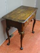 A LATE 18th/EARLY 19th CENTURY OAK LOWBOY on cabriole corner supports, 82 cms wide, 48 cms deep,