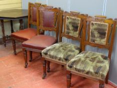 A SET OF FOUR EDWARDIAN CARVED BACK CHAIRS and an octagonal occasional table