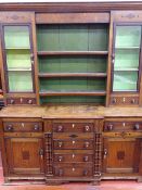 A 19th CENTURY ANGLESEY OAK & PINE BREAKFRONT DRESSER with three over three 'T' arrangement